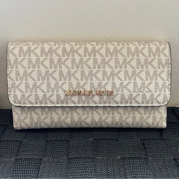 MICHAEL Michael Kors Handbags - Michael Kors Trifold Logo Wallet. Brand new, never used.